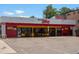 Brothers BBQ restaurant front with parking and signage at 558 N Washington St # 305, Denver, CO 80203