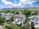 Aerial view of home showing the private fenced backyard with deck and mountain views at 9610 S Dover Way, Littleton, CO 80127