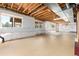 Unfinished basement with insulated walls and exposed utilities at 9610 S Dover Way, Littleton, CO 80127