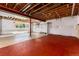 Unfinished basement awaiting design featuring concrete floors and insulated walls at 9610 S Dover Way, Littleton, CO 80127