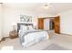 Bedroom with decor and carpeted floor at 9610 S Dover Way, Littleton, CO 80127