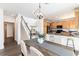 Inviting dining area that seamlessly connect to the kitchen and the staircase at 9610 S Dover Way, Littleton, CO 80127