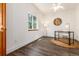 Simple office with hard floors and a small desk at 9610 S Dover Way, Littleton, CO 80127