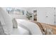 Inviting main bedroom with an ensuite bathroom and natural light streaming in at 417 S Pontiac Way, Denver, CO 80210