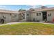 Grey duplex with a grassy yard at 1217 Osceola St, Denver, CO 80204
