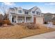 Charming two-story home with a covered front porch and blue shutters on the windows at 2918 W 135Th Pl, Thornton, CO 80241