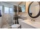 Bathroom featuring neutral tile, shower, toilet, and vanity at 6212 S Ash W Cir, Centennial, CO 80121