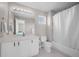 Bathroom featuring a single sink vanity, tiled floors, a shower-tub combination, and a bright lighting at 22062 E Irish Dr, Aurora, CO 80016