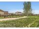 Well-maintained community pathway with lush landscaping and attractive homes at 2165 Summerlin Ln, Longmont, CO 80503