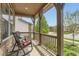 Relaxing front porch with rocking chairs and decorative pillows, perfect for enjoying the outdoors at 2165 Summerlin Ln, Longmont, CO 80503