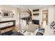 Spacious living room features hardwood floors, neutral paint, and an open concept layout at 2165 Summerlin Ln, Longmont, CO 80503