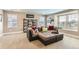 Bright living room space featuring carpet floors, plentiful sunlight, and comfortable seating area at 2165 Summerlin Ln, Longmont, CO 80503