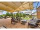 Relaxing outdoor patio with comfortable seating and a stylish pergola at 2165 Summerlin Ln, Longmont, CO 80503