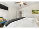 Cozy bedroom featuring a ceiling fan, large closet, and a calming color palette at 5115 Osceola St, Denver, CO 80212