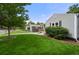 Lovely home with a verdant lawn and charming front porch, creating an inviting curb appeal at 5115 Osceola St, Denver, CO 80212