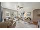 Bright living room features stylish furniture, neutral decor, and ample natural light at 5115 Osceola St, Denver, CO 80212