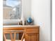 Built-in desk area with wooden cabinetry and a window view, perfect for a home office at 10565 Wildhurst Cir, Highlands Ranch, CO 80126