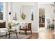 Bright living area featuring modern furniture, a stylish rug, and lots of natural light at 10565 Wildhurst Cir, Highlands Ranch, CO 80126