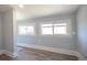 Basement room featuring painted walls and luxury vinyl plank flooring at 4059 Quivas St, Denver, CO 80211