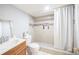 Bathroom featuring a shower, a neutral color scheme, and traditional fixtures at 4059 Quivas St, Denver, CO 80211