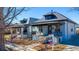 View of a single-Gathering home featuring a covered porch, yard, and classic architectural details at 4059 Quivas St, Denver, CO 80211