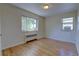 Inviting bedroom featuring hardwood floors, a large window, and natural light, offering a cozy and relaxing space at 2100 N Franklin St # 8, Denver, CO 80205