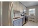 Updated kitchen featuring stainless steel appliances, bright cabinets, and ample counter space at 2100 N Franklin St # 8, Denver, CO 80205