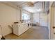 Clean and functional laundry room with multiple washing machines, a sink, and ample lighting, making laundry chores easy at 2100 N Franklin St # 8, Denver, CO 80205