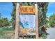 Nature Play area sign with information about Denver Parks & Recreation and outdoor activities at 2100 N Franklin St # 8, Denver, CO 80205
