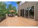 Spacious deck featuring comfortable seating, perfect for enjoying the outdoors with easy access to the house at 1456 Shavano Ct, Evergreen, CO 80439