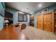 Home office featuring a built-in desk, closet, and shelving for storage, perfect for work or study at 1456 Shavano Ct, Evergreen, CO 80439