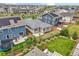 Bird's eye view of the house with fenced yard and lush, green lawn at 5928 N Odessa St, Aurora, CO 80019