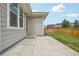 View of the backyard featuring a concrete patio and a wood fence at 5928 N Odessa St, Aurora, CO 80019