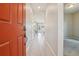 Inviting entryway featuring bright, clean interiors with hardwood flooring, opening to living area at 5928 N Odessa St, Aurora, CO 80019