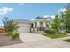 Inviting home with well-kept lawn, two-car garage, and charming front porch at 5928 N Odessa St, Aurora, CO 80019