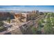 Primary-planned community featuring streetscapes with landscaped medians and pedestrian walkways at 3334 N Catawba Way, Aurora, CO 80019