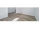 Empty living room with wood look floors at 3334 N Catawba Way, Aurora, CO 80019
