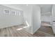 Bright room featuring hardwood floors, white walls, and windows that provide plenty of natural light at 3334 N Catawba Way, Aurora, CO 80019