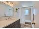 Clean bathroom featuring a modern vanity and a shower with a tub at 352 S Lafayette St # 204, Denver, CO 80209