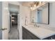 Modern bathroom with updated vanity, faucet, and hardware at 352 S Lafayette St # 204, Denver, CO 80209