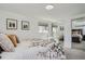 Serene bedroom featuring a mirrored closet and bright natural light at 352 S Lafayette St # 204, Denver, CO 80209