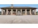 Architectural building with symmetrical design, stairs, and benches at 352 S Lafayette St # 204, Denver, CO 80209