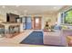 Bright living room featuring a fireplace and L-shaped sofa at 870 Grape St, Denver, CO 80220