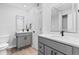 Updated bathroom with gray vanity, white subway tile, and modern fixtures at 8695 Yukon St # F, Arvada, CO 80005