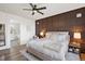 Elegant bedroom boasts stylish decor, a luxurious bed, and an ensuite bathroom with modern fixtures at 1053 Snow Lily Ct, Castle Pines, CO 80108