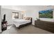 Basement bedroom with bright natural light, neutral color, and comfortable bed at 1053 Snow Lily Ct, Castle Pines, CO 80108