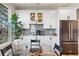 Bright eat-in kitchen with a breakfast nook, perfect for enjoying morning coffee with a view at 1053 Snow Lily Ct, Castle Pines, CO 80108