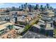 Fantastic aerial view showcasing the property with the city skyline and Coors Field in the background at 2960 Inca St # 308, Denver, CO 80202