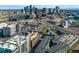 Stunning aerial view showcasing the Denver skyline with the property highlighted with the 'R' icon at 2960 Inca St # 308, Denver, CO 80202
