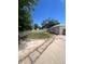 A spacious backyard features a combination of grass and gravel areas, fenced for privacy at 1132 Moline St, Aurora, CO 80010
